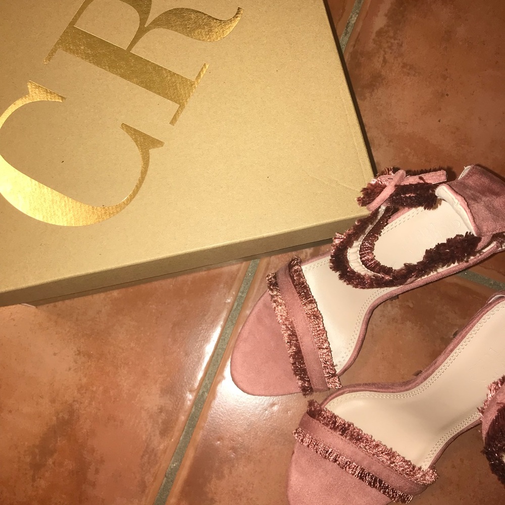 Pink suede ankle strap heels